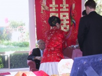 Handing_tea_to_the_grandparents.jpg